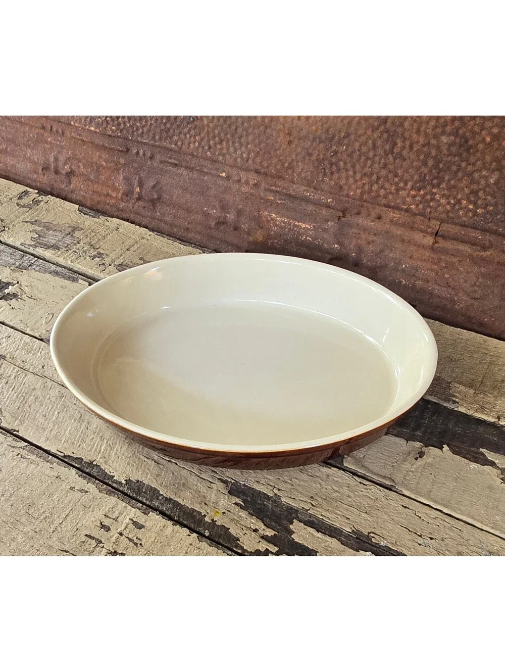 Vintage Ceramic oval baking dish with brown exterior and cream interior